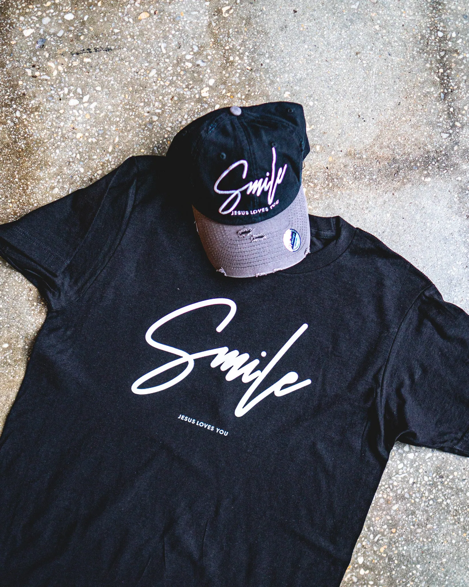 Smile Jesus Loves You Adult Box T-Shirt & Black/Grey Distressed Hat Bundle