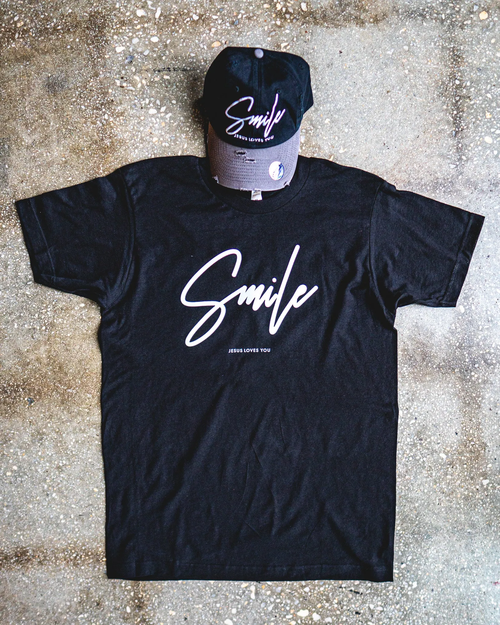 Smile Jesus Loves You Adult Box T-Shirt & Black/Grey Distressed Hat Bundle
